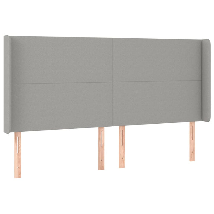 sengegavl med kanter 163x16x118/128 cm stof lysegrå