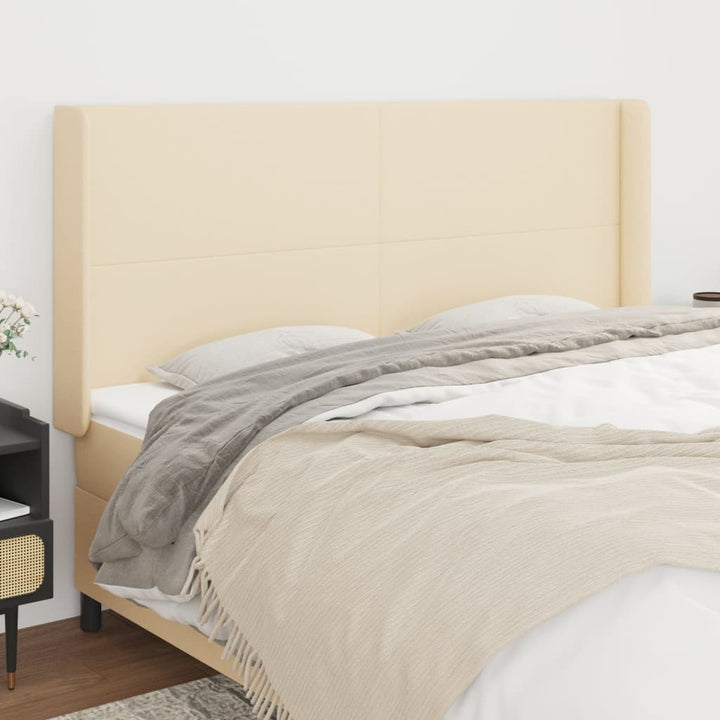 sengegavl med kanter 163x16x118/128 cm stof cremefarvet