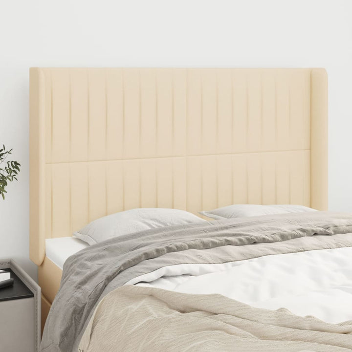 sengegavl med kanter 147x16x118/128 cm stof cremefarvet