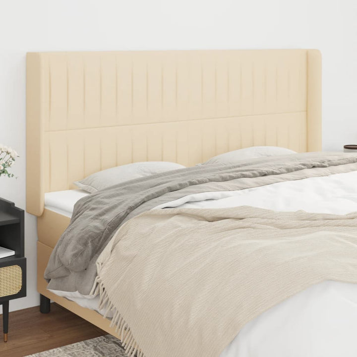 sengegavl med kanter 163x16x118/128 cm stof cremefarvet