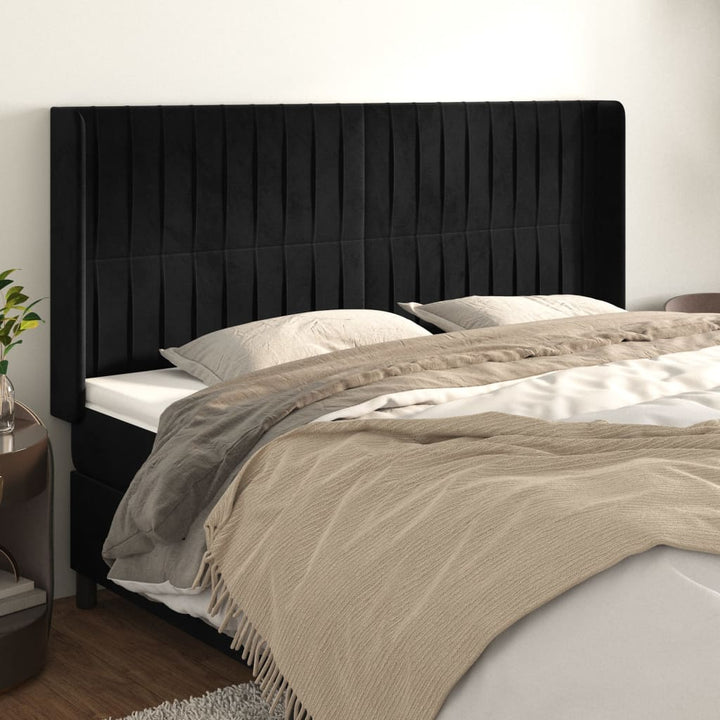 sengegavl med kanter 163x16x118/128 cm fløjl sort