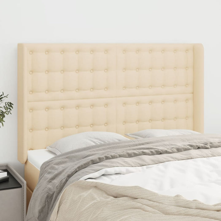 sengegavl med kanter 147x16x118/128 cm stof cremefarvet