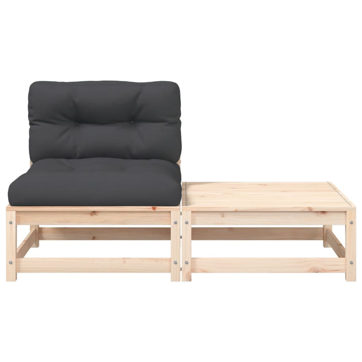 sofa med hynder og fodskammel uden armlæn
