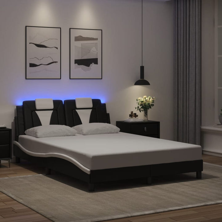 sengestel med LED-lys 140x200 cm kunstlæder sort og hvid