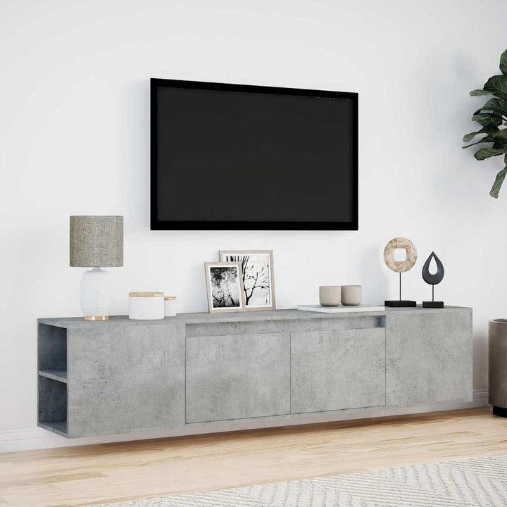 væghængt tv-bord med LED-lys 180x31x39,5 cm betongrå