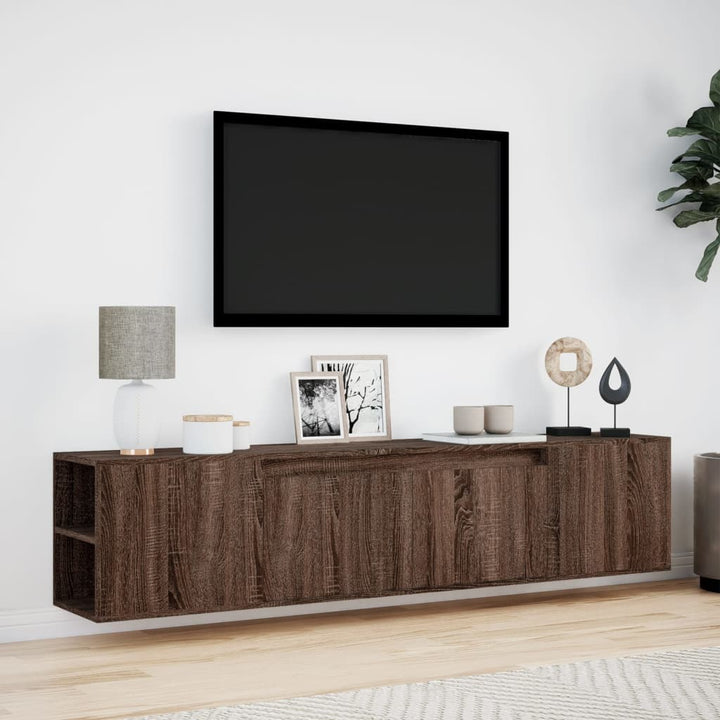 væghængt tv-bord med LED-lys 180x31x39,5 cm brun egetræsfarve