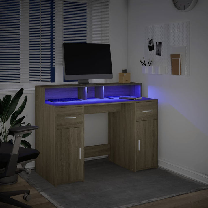 skrivebord med LED-lys 120x55x91 cm konstrueret træ sonoma-eg